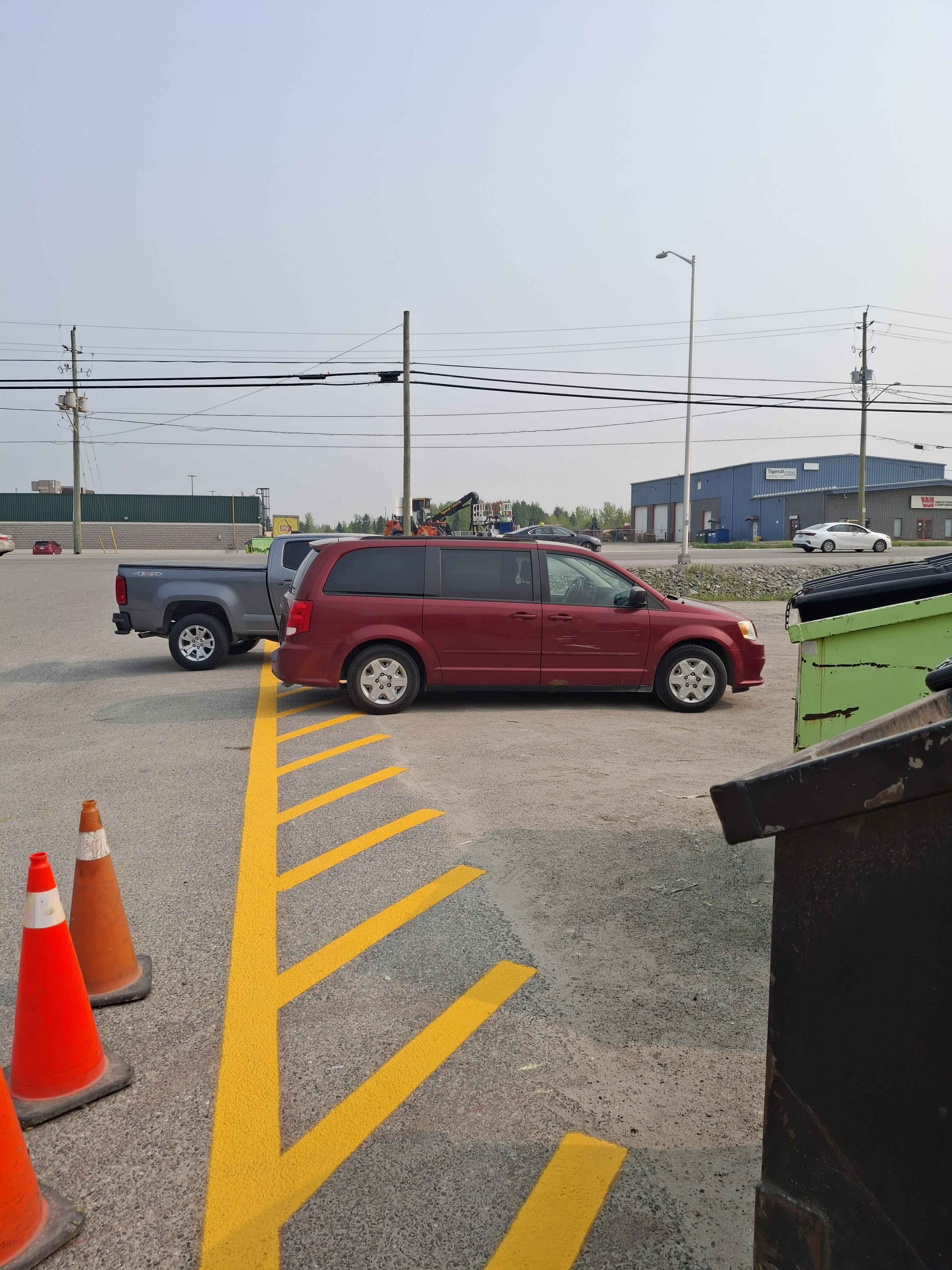 Sealcoated parking lot with fresh pavement markings