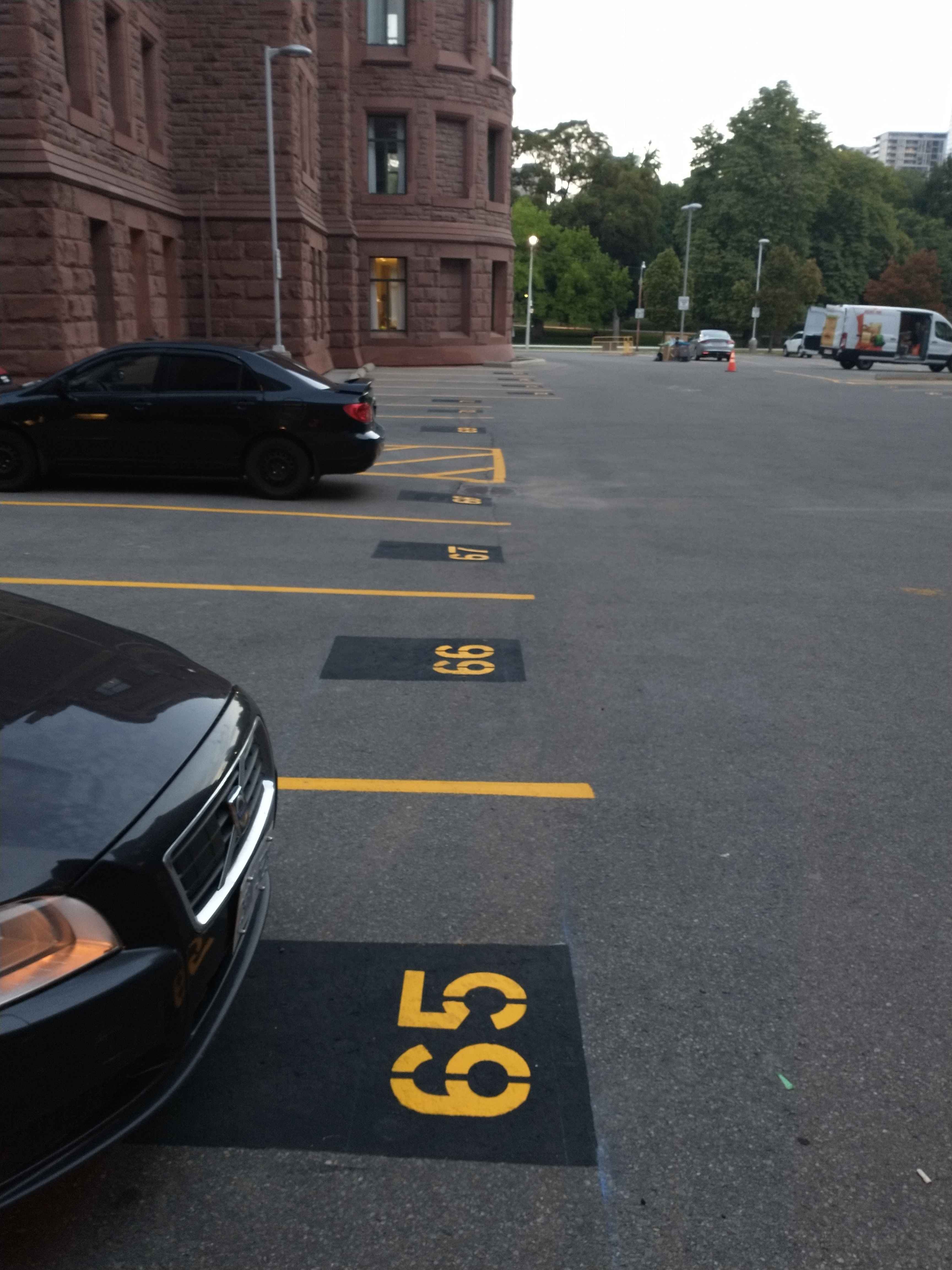 Sealcoated parking lot with fresh pavement markings